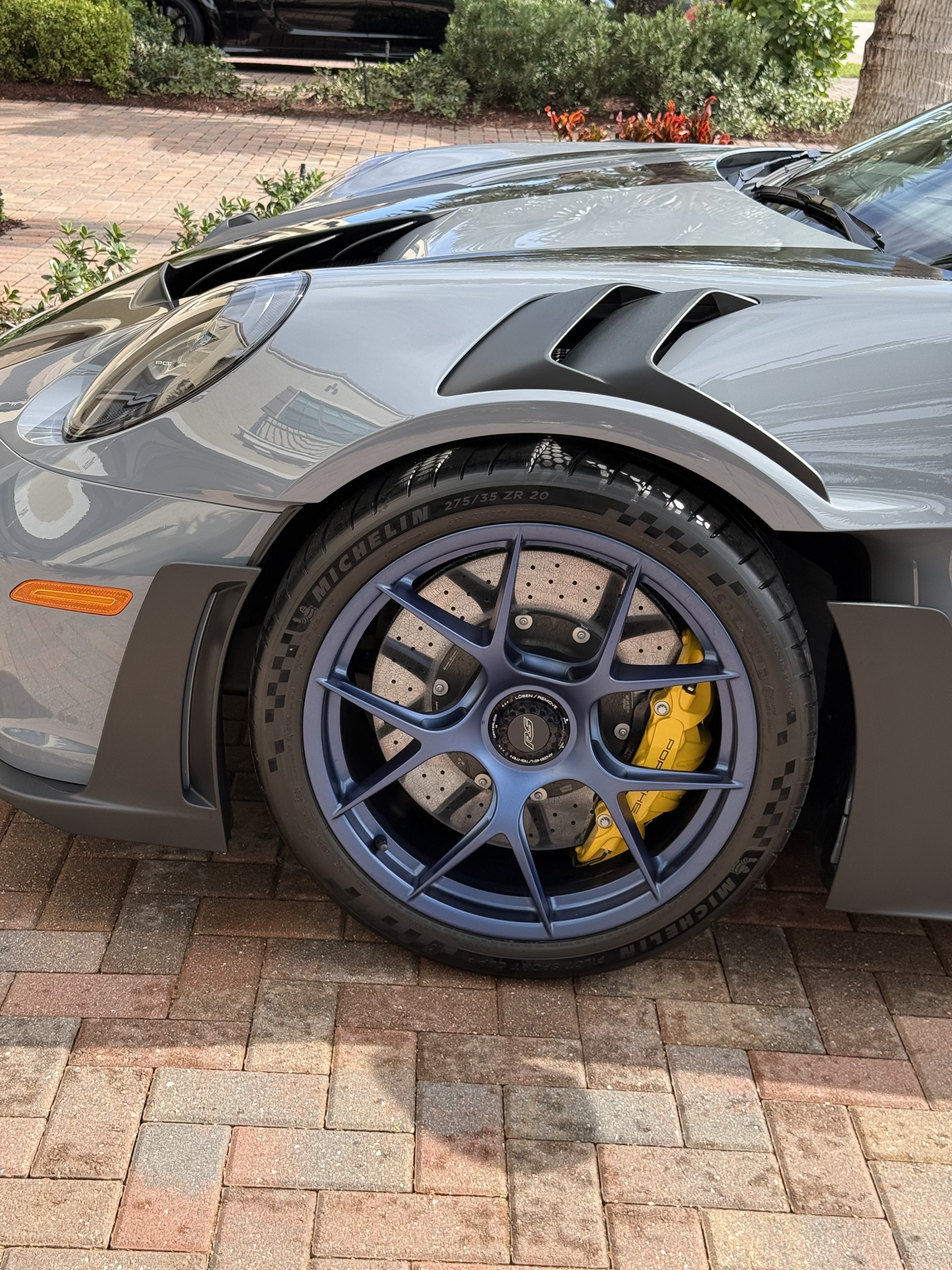 Porsche 911 GT3 RS wheel and brake caliper after detailing